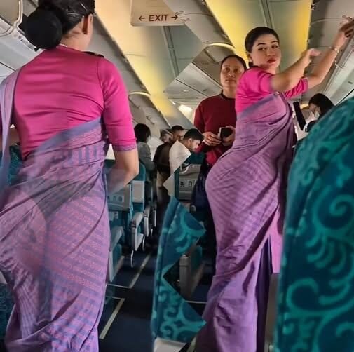 Flight Attendant Breaks the Internet with Her Daring Uniform!