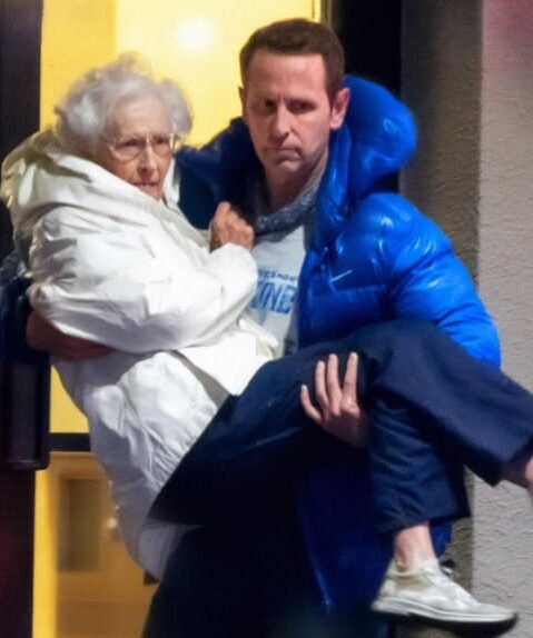 I Carried My Elderly Neighbor down Nine Flights During a Fire – Two Days Later, a Man Showed Up at My Door and Said, ‘You Did It on Purpose!’